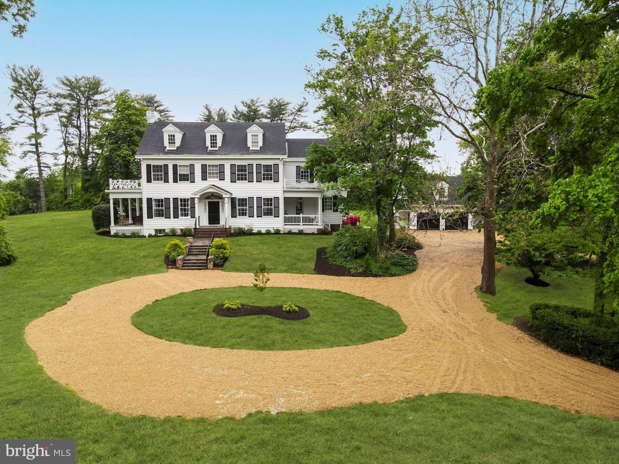 1031 Pine Hill Road McLean, VA 22101 - Photo 2 of 39 a view of a house with a swimming pool