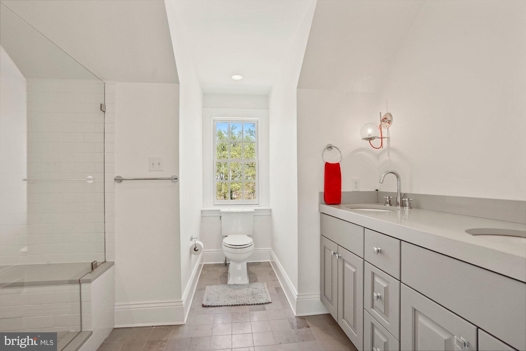 1031 Pine Hill Road McLean, VA 22101 - Photo 25 of 39 a bathroom with a sink toilet and shower