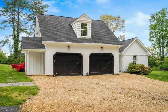 a front view of a house with yard