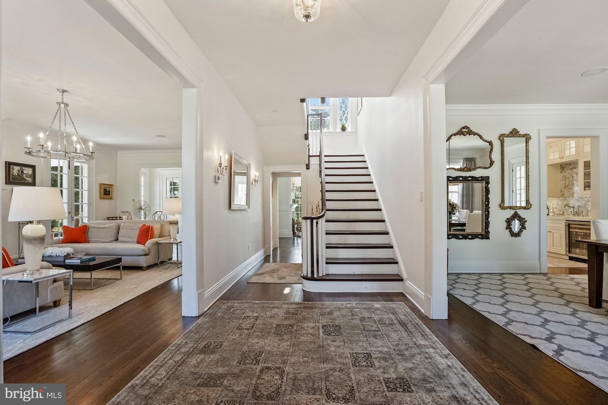 1031 Pine Hill Road McLean, VA 22101 - Photo 4 of 39 a view of a livingroom with wooden floor and a rug