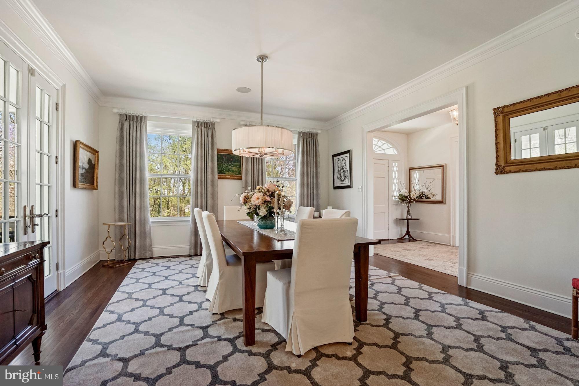 1031 Pine Hill Road McLean, VA 22101 - Photo 7 of 39 a view of a dining room with furniture window and wooden floor