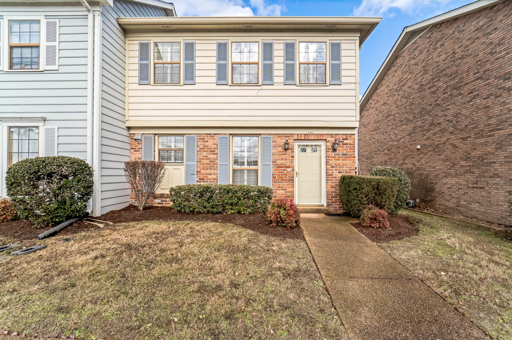 525 General George Patton Road Nashville, TN 37221 - Photo 1 of 22 a front view of a house with a yard