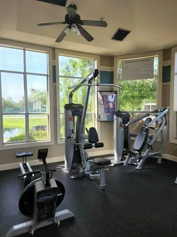 a view of a swimming pool with lounge chair