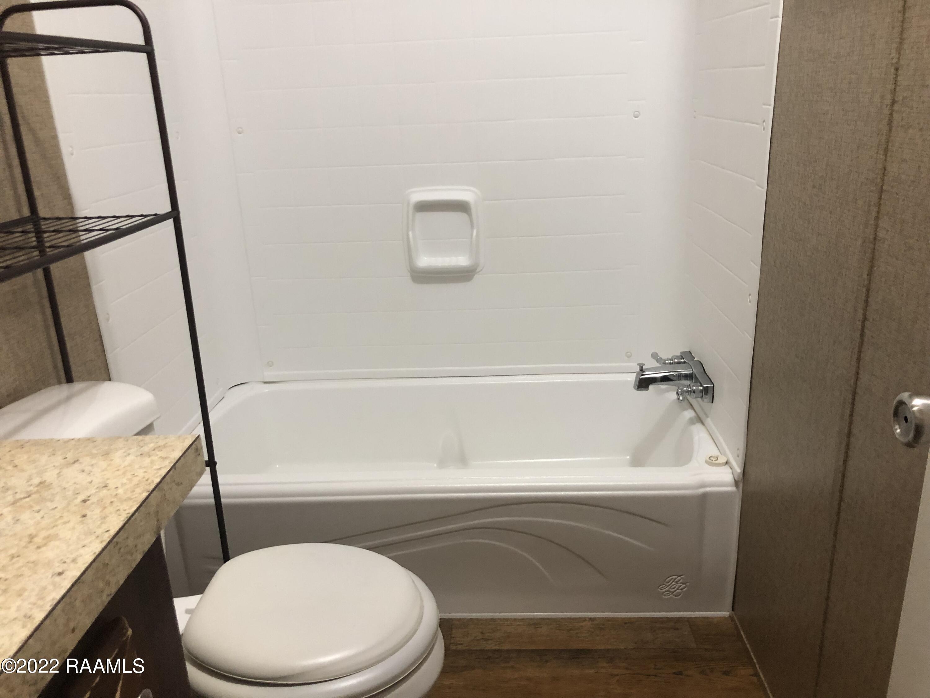 8899 Fusilier Road, Unit 16 Maurice, LA 70555 - Photo 23 of 25 Hall bathroom