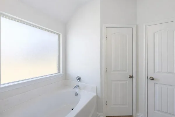a bathroom with a bathtub