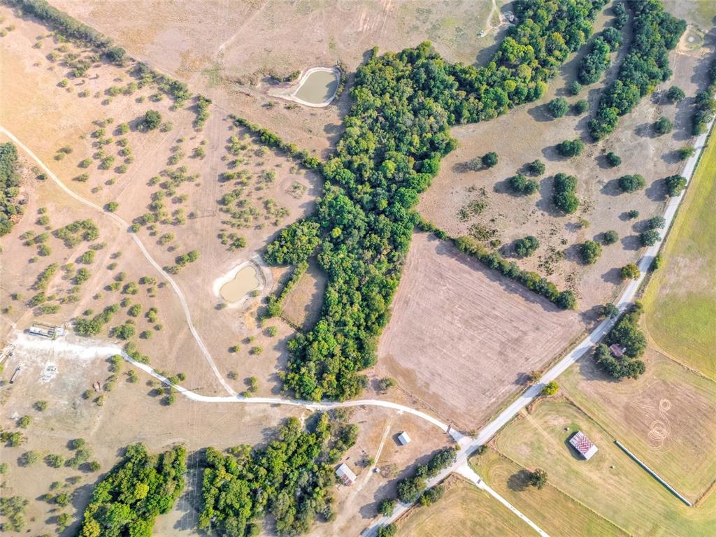 0 Deep Creek Rhome, TX 76078 - Photo 2 of 9 an aerial view of house with a yard