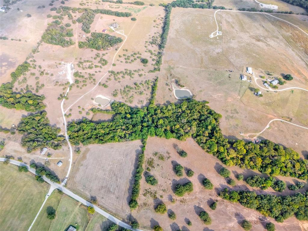 0 Deep Creek Rhome, TX 76078 - Photo 3 of 9 a view of a garden with plants