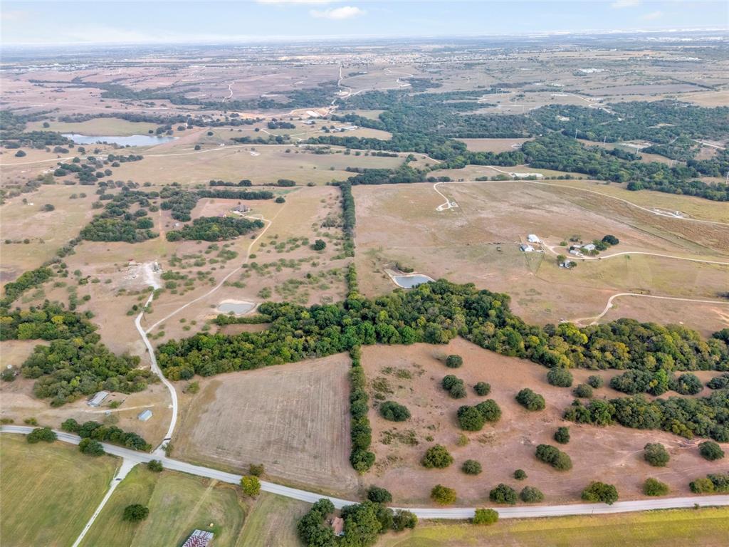 0 Deep Creek Rhome, TX 76078 - Photo 6 of 9 an aerial view of a house