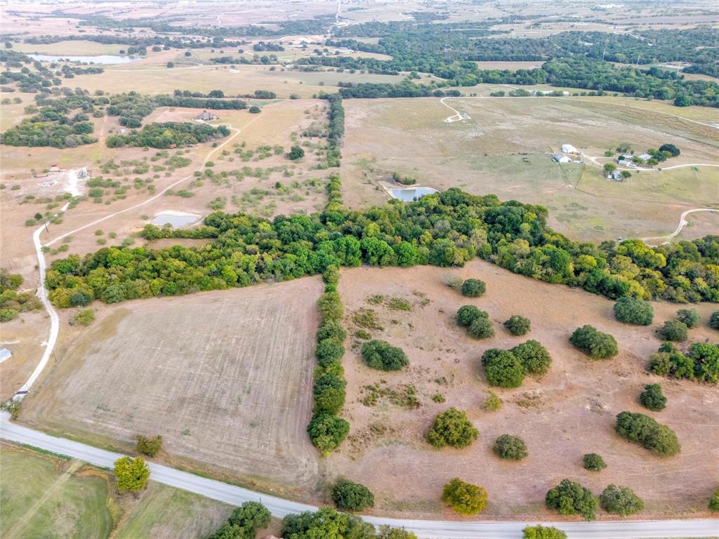 0 Deep Creek Rhome, TX 76078 - Photo 7 of 9 an aerial view of residential houses with outdoor space