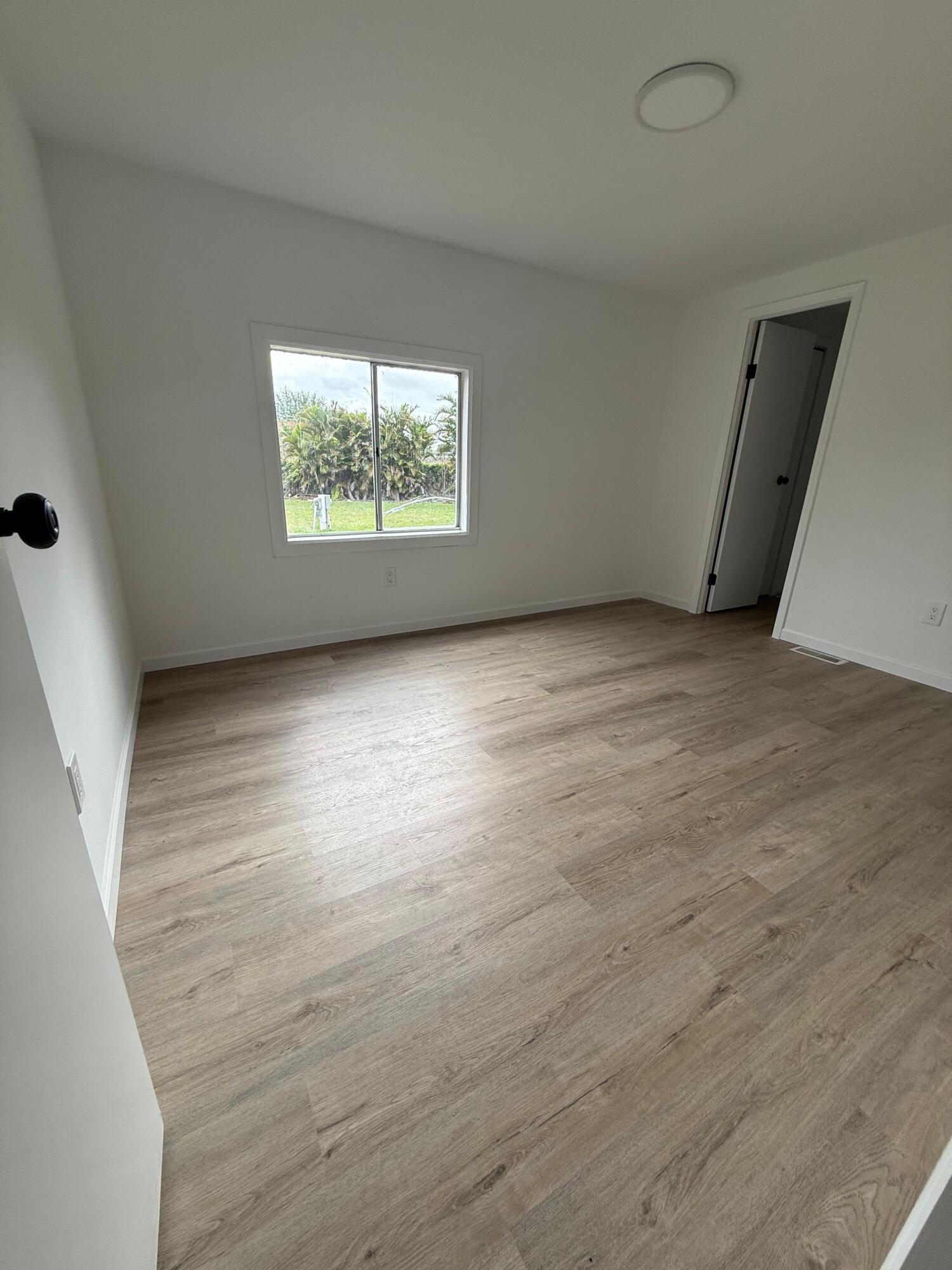 4022 68th Street North, Unit 826 Riviera Beach, FL 33404 - Photo 11 of 12 Primary Bedroom