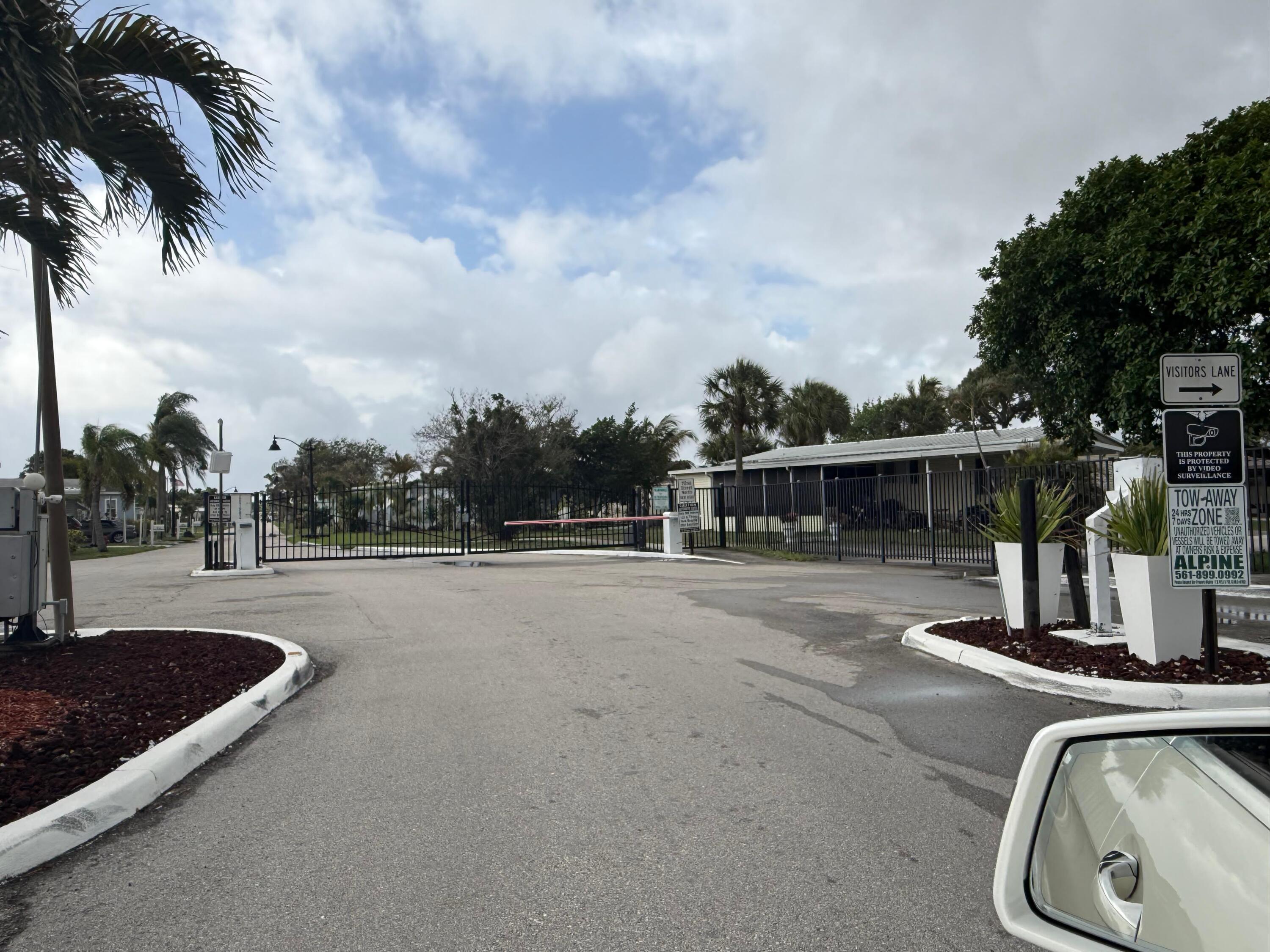 4022 68th Street North, Unit 826 Riviera Beach, FL 33404 - Photo 12 of 12 Entry Gate