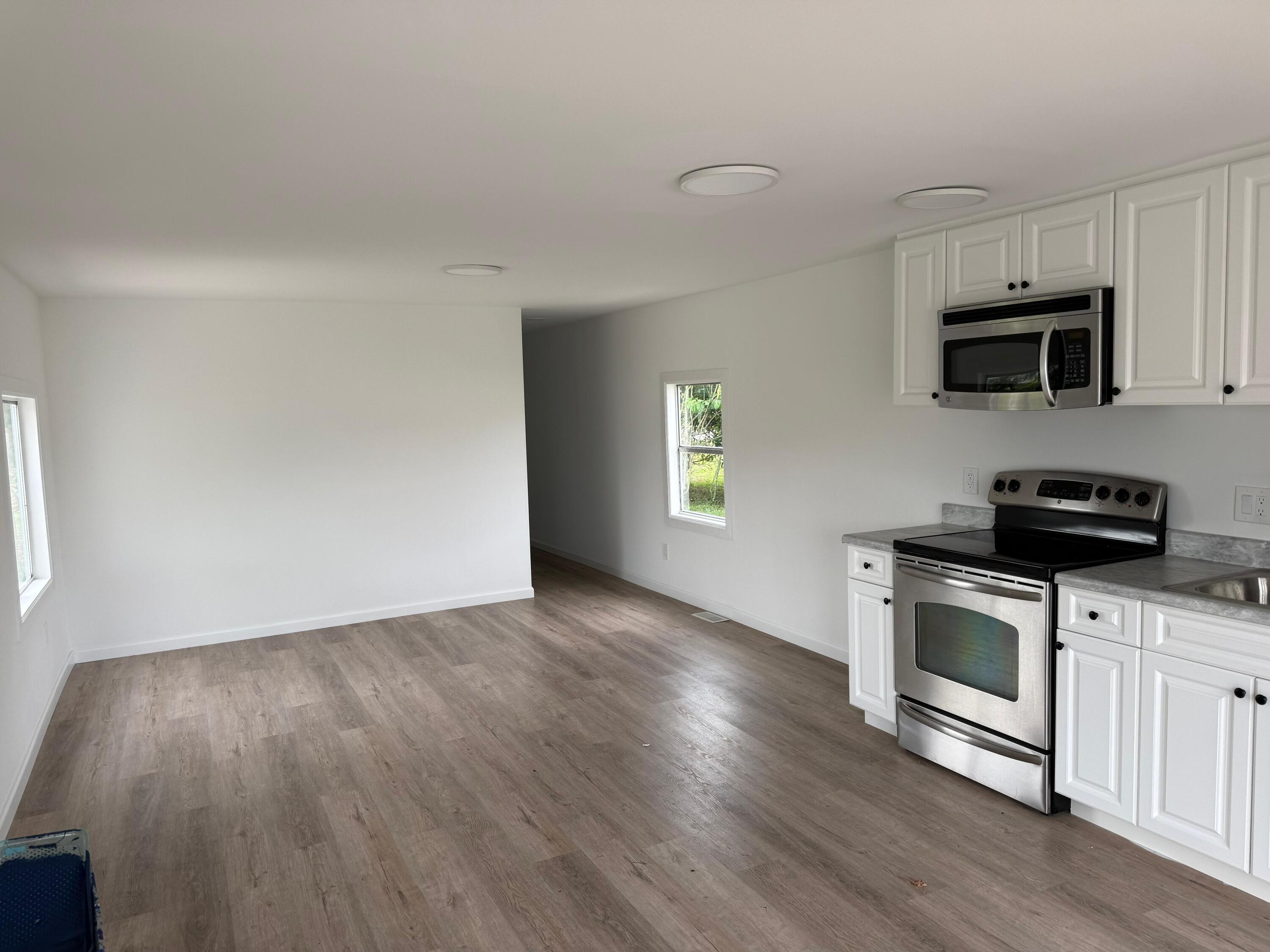 4022 68th Street North, Unit 826 Riviera Beach, FL 33404 - Photo 3 of 12 Kitchen & Living room