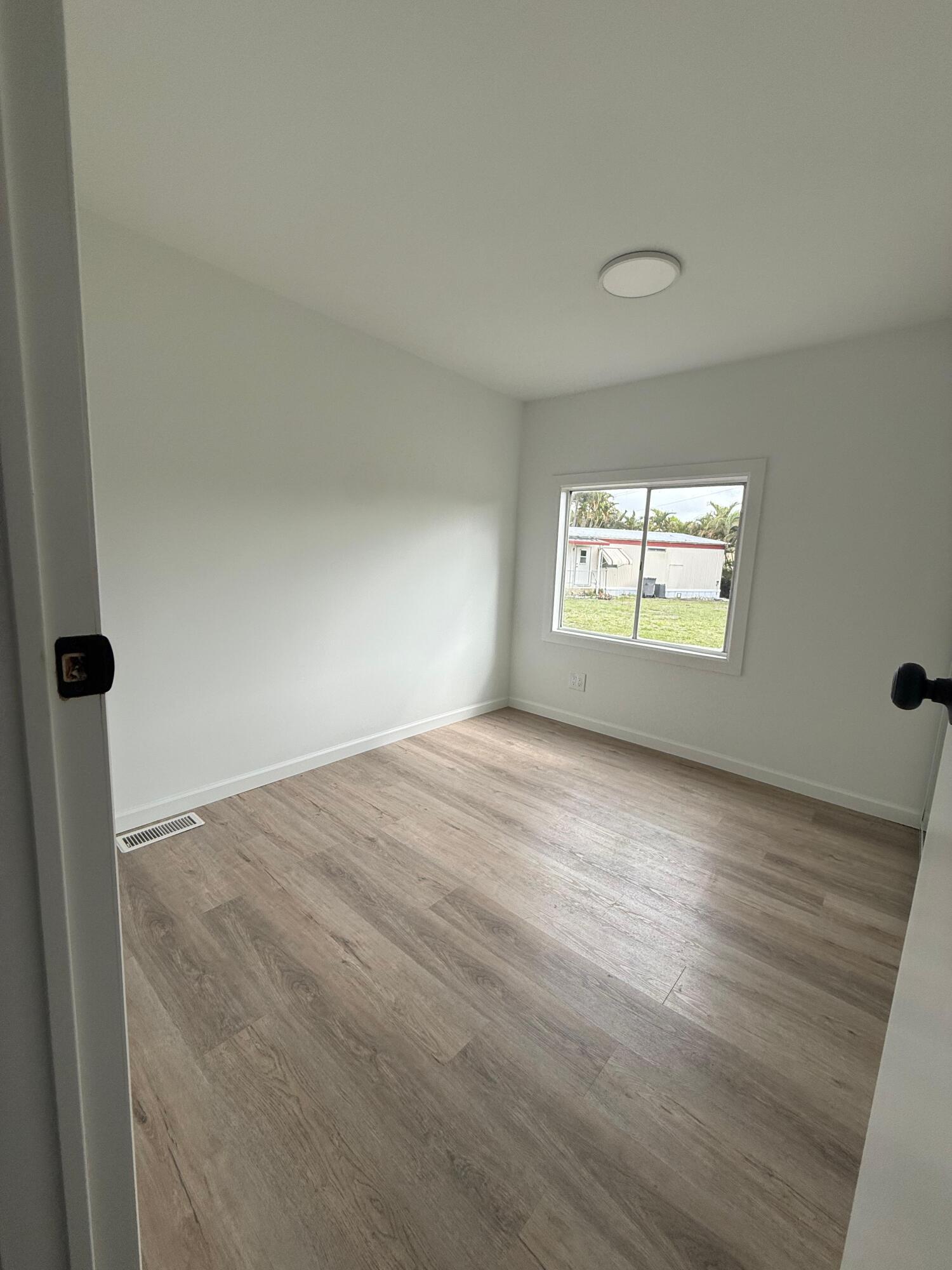 4022 68th Street North, Unit 826 Riviera Beach, FL 33404 - Photo 6 of 12 2nd Bedroom