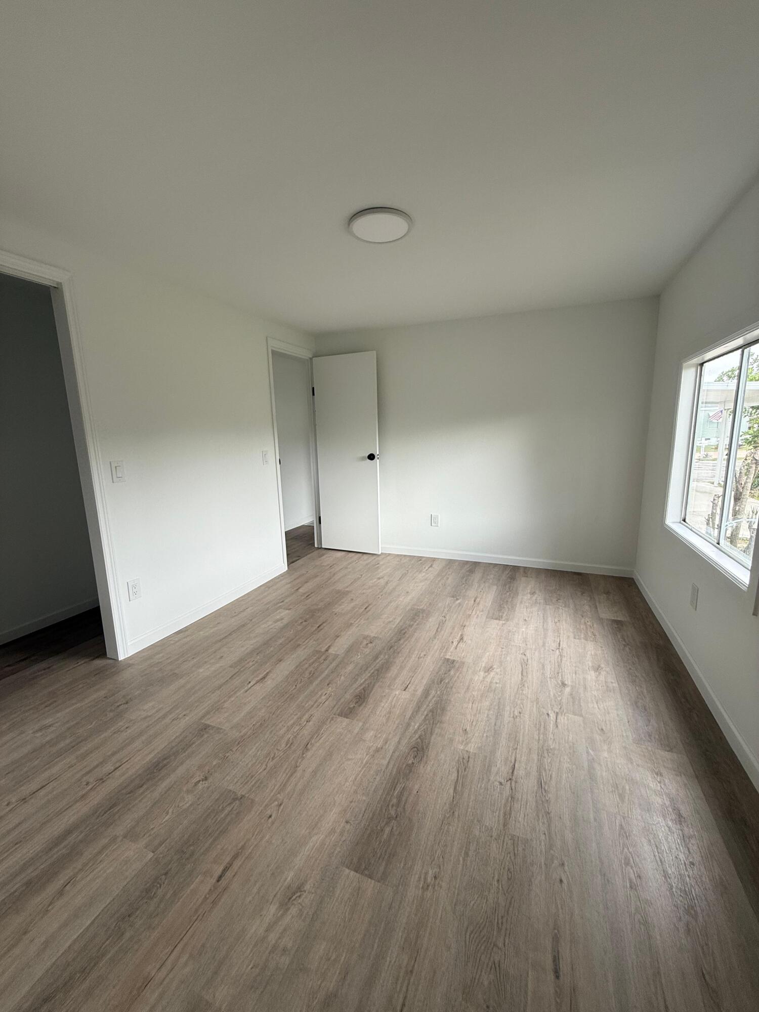 4022 68th Street North, Unit 826 Riviera Beach, FL 33404 - Photo 10 of 12 Primary Bedroom