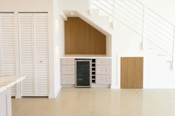 a view of an empty room with a fireplace