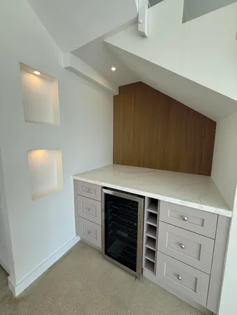 a kitchen with a cabinets and a stove