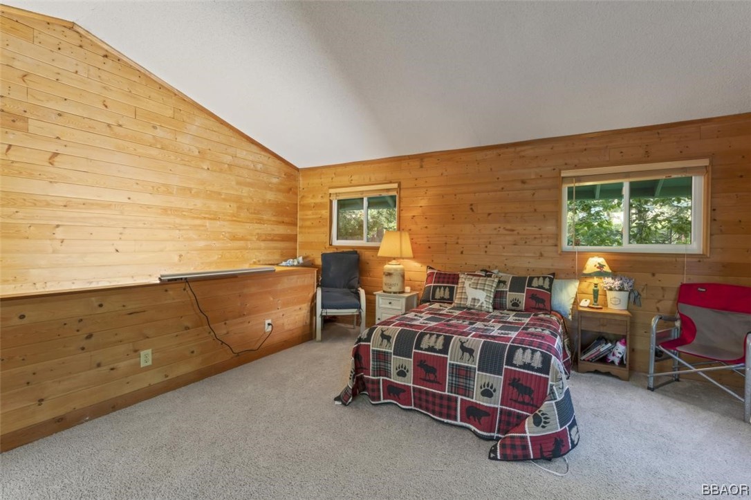 623 Highway 138 Crestline, CA 92325 - Photo 14 of 24 a bedroom with furniture and a window