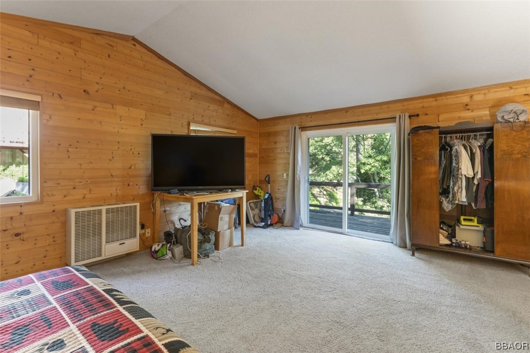 623 Highway 138 Crestline, CA 92325 - Photo 15 of 24 a view of a livingroom with furniture and a flat screen tv