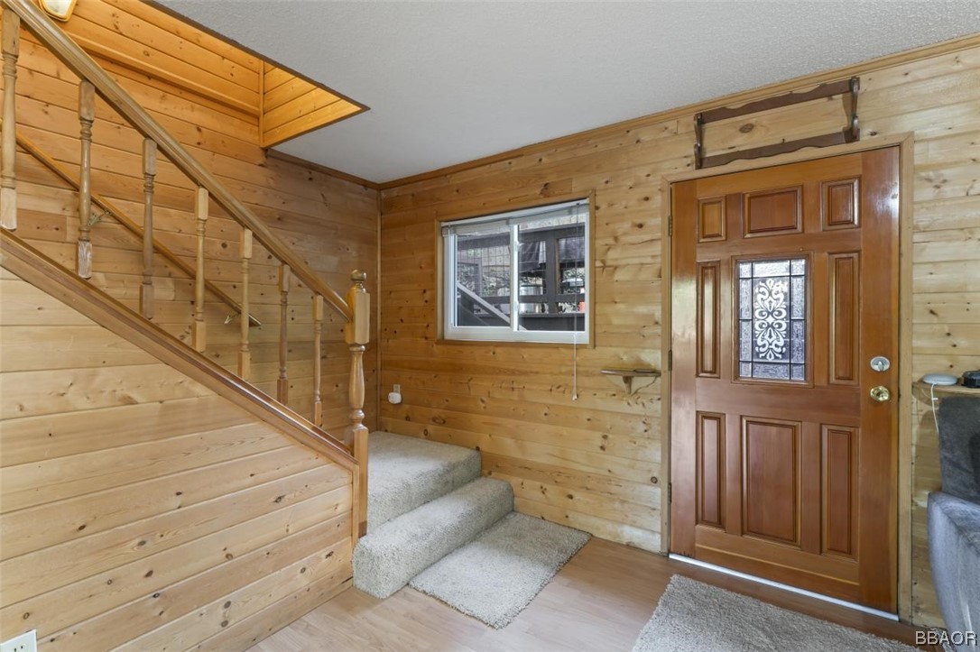 623 Highway 138 Crestline, CA 92325 - Photo 17 of 24 a view of front door of house with stairs