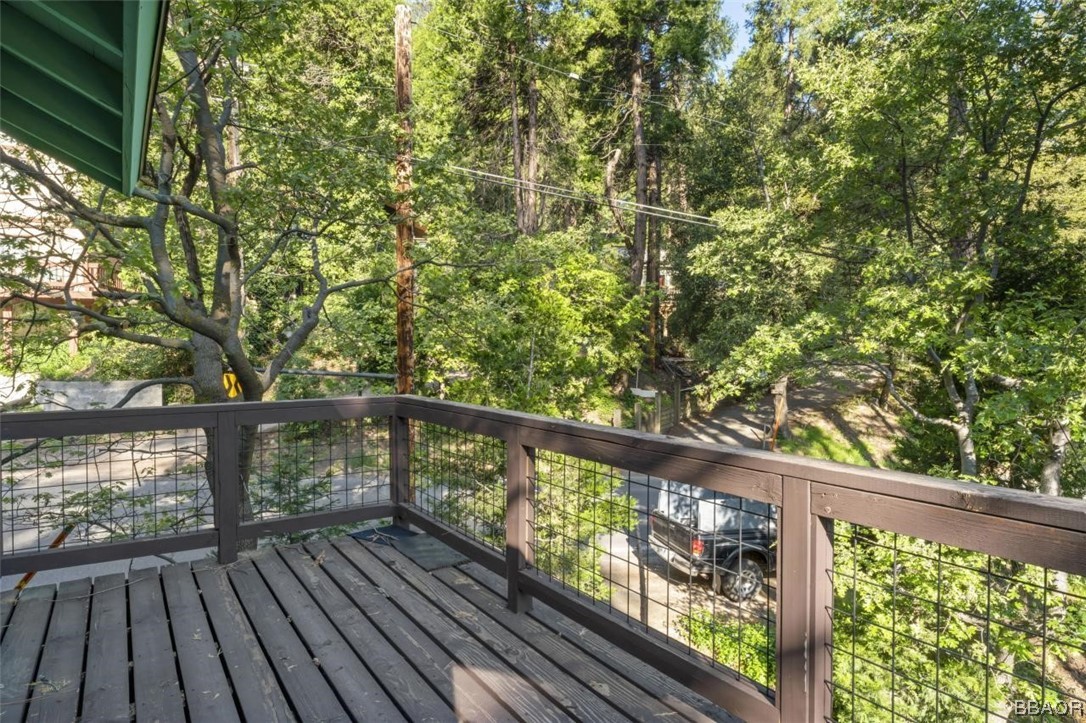 623 Highway 138 Crestline, CA 92325 - Photo 21 of 24 a view of balcony with wooden floor