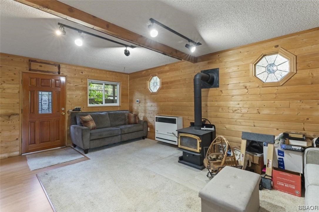 623 Highway 138 Crestline, CA 92325 - Photo 3 of 24 a living room with furniture and a fireplace