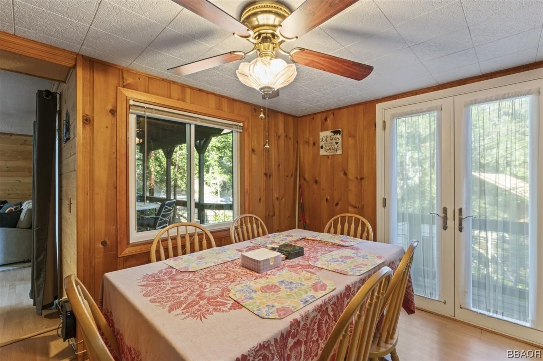 623 Highway 138 Crestline, CA 92325 - Photo 5 of 24 a dining room with a table and chairs