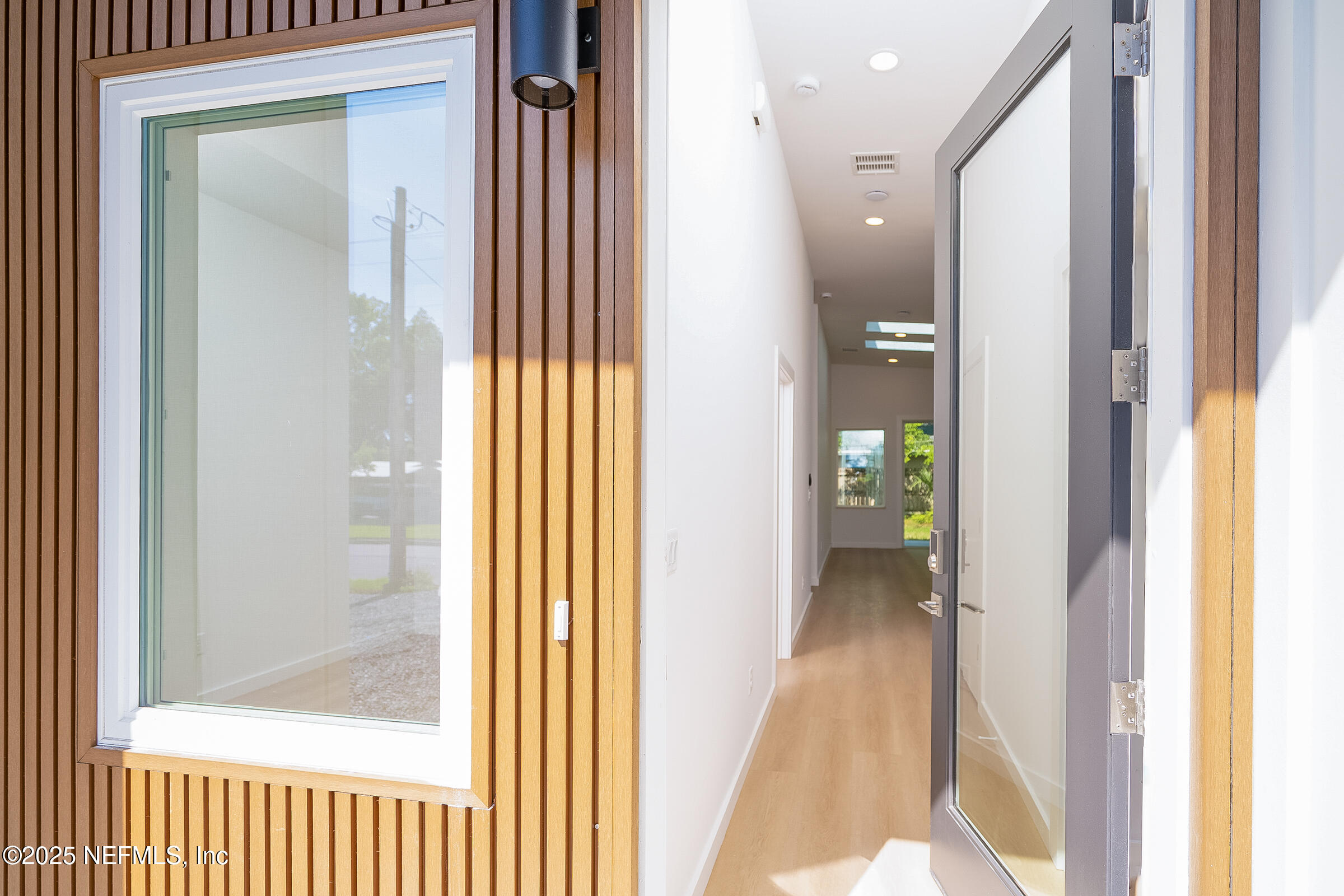 113 Ocean Boulevard St. Augustine, FL 32095 - Photo 2 of 15 a view of a bathroom from a hallway