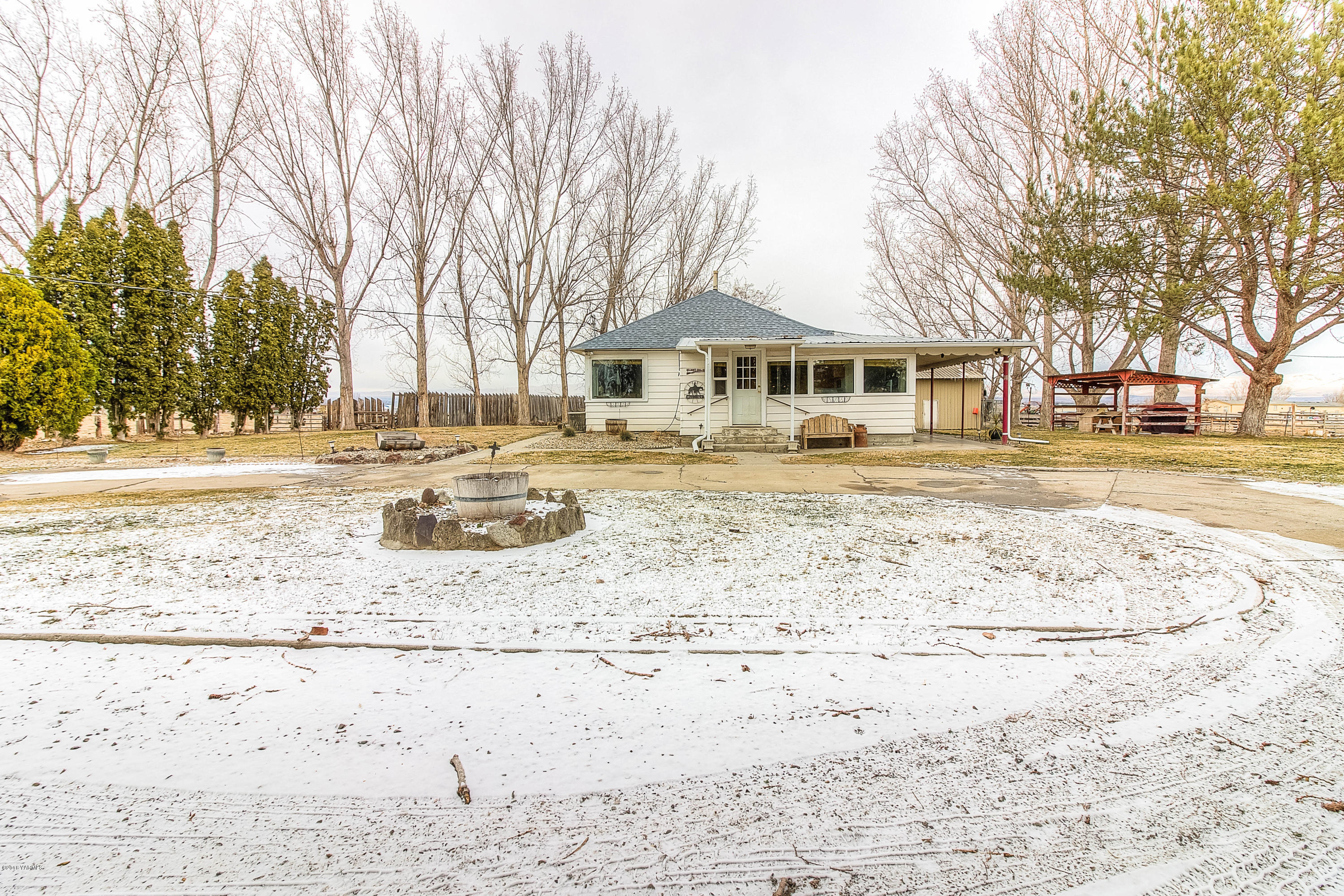 1091 Northbank Road Outlook, WA 98938 - Photo 18 of 18 a view of a house with a yard covered in snow