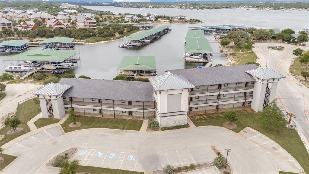 3412 Scenic Point Road, Unit 102 Graford, TX 76449 - Photo 2 of 31 an aerial view of a house with a garden