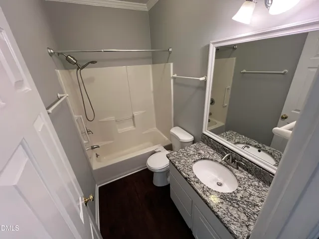 a view of entryway with wooden floor