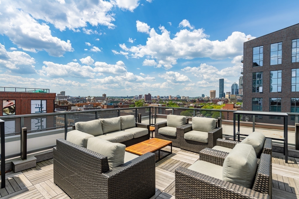 32 Traveler Street, Unit 411 Boston, MA 02118 - Photo 13 of 22 a building outdoor space with patio furniture