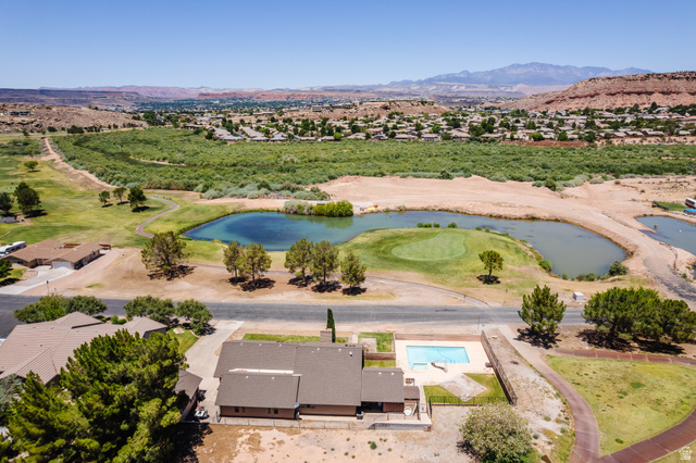 1470 Redwood Tree Street St. George, UT 84790 - Photo 38 of 53 Aerial perspective showcasing a property featuring a private swimming pool