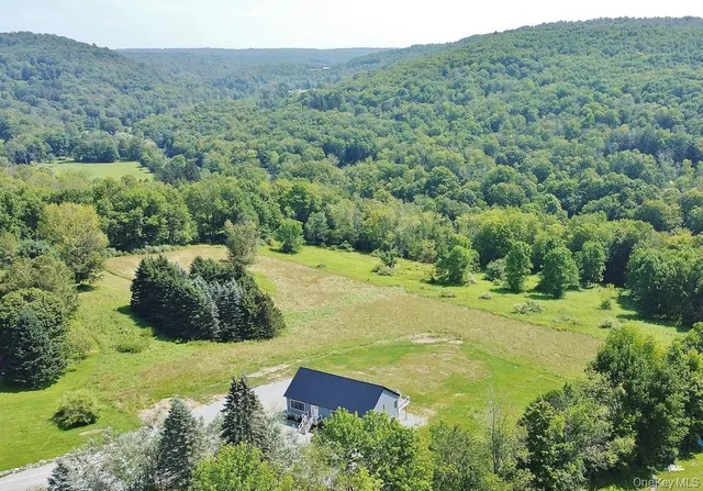 a view of a yard with an outdoor space