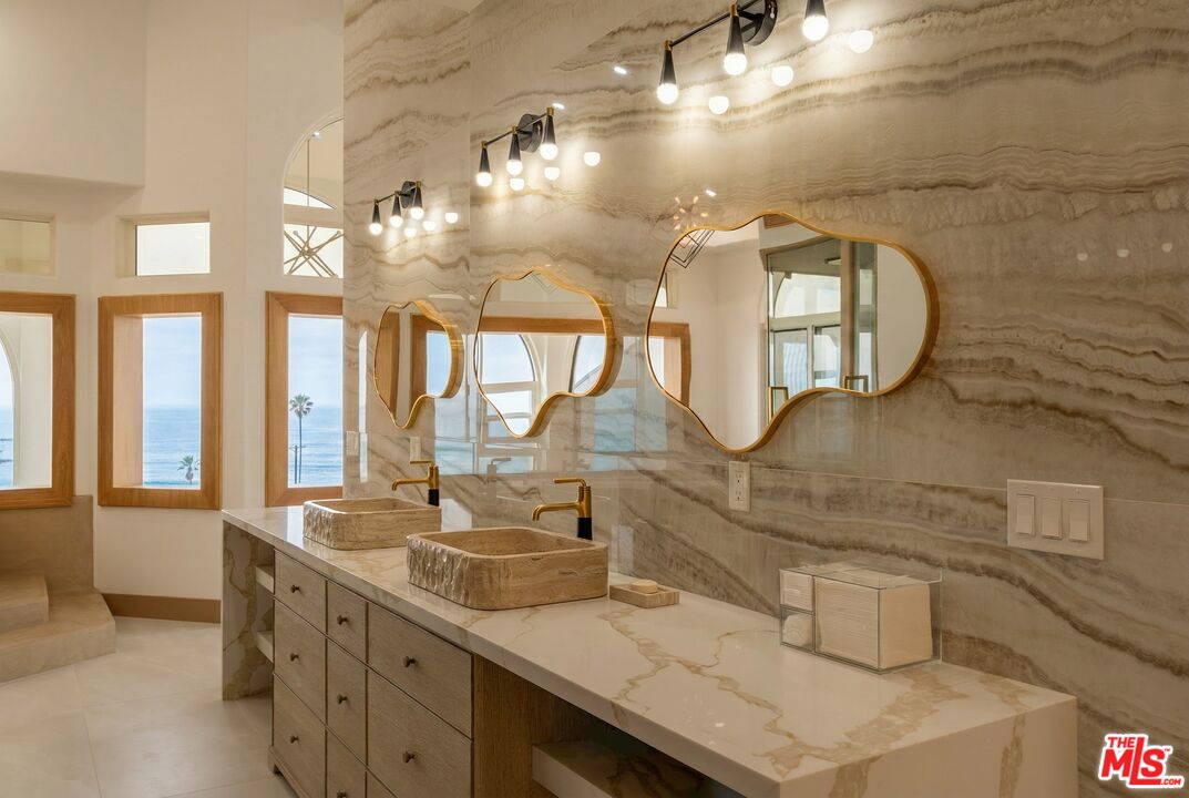 147 Napoleon Street Playa del Rey, CA 90293 - Photo 22 of 33 a bathroom with a double vanity sink mirror and toilet