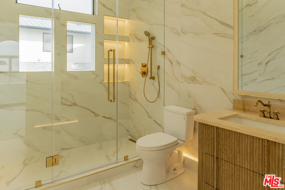 147 Napoleon Street Playa del Rey, CA 90293 - Photo 24 of 33 a bathroom with a sink toilet and shower