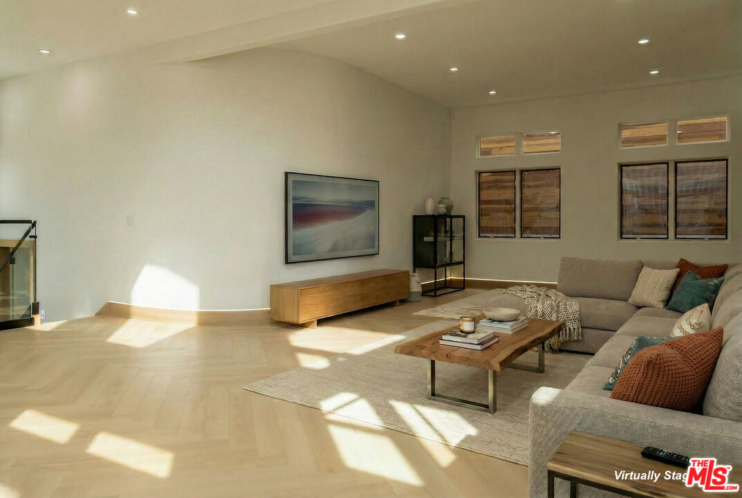 147 Napoleon Street Playa del Rey, CA 90293 - Photo 25 of 33 a living room with furniture and windows