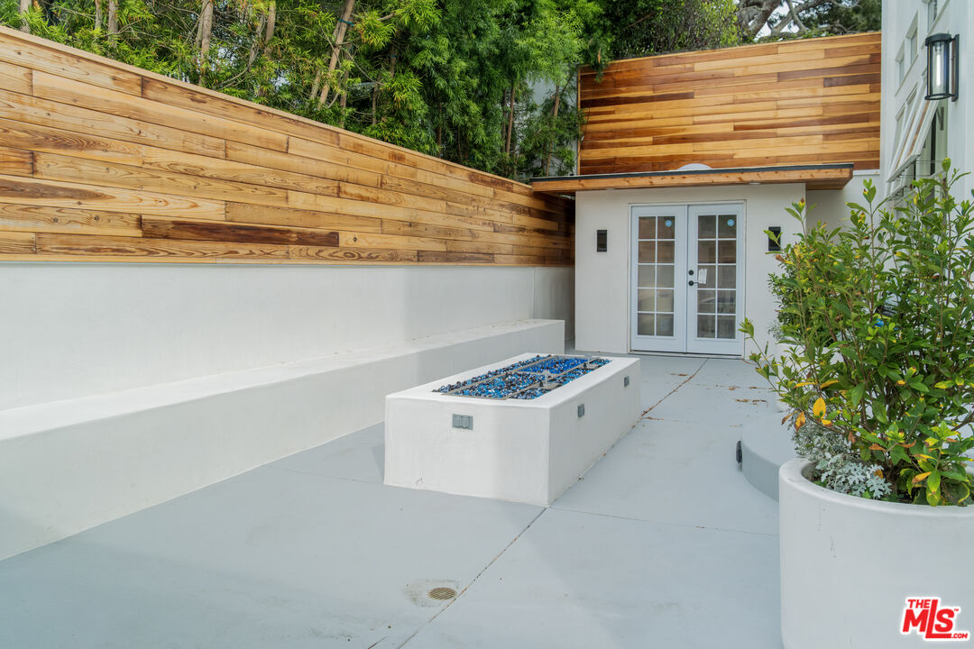 147 Napoleon Street Playa del Rey, CA 90293 - Photo 26 of 33 a view of a house with backyard and trees