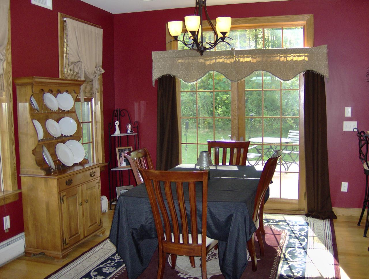 998 Williamsburg Road Ashfield, MA 01330 - Photo 13 of 46 a view of a dining room with furniture a chandelier and wooden floor