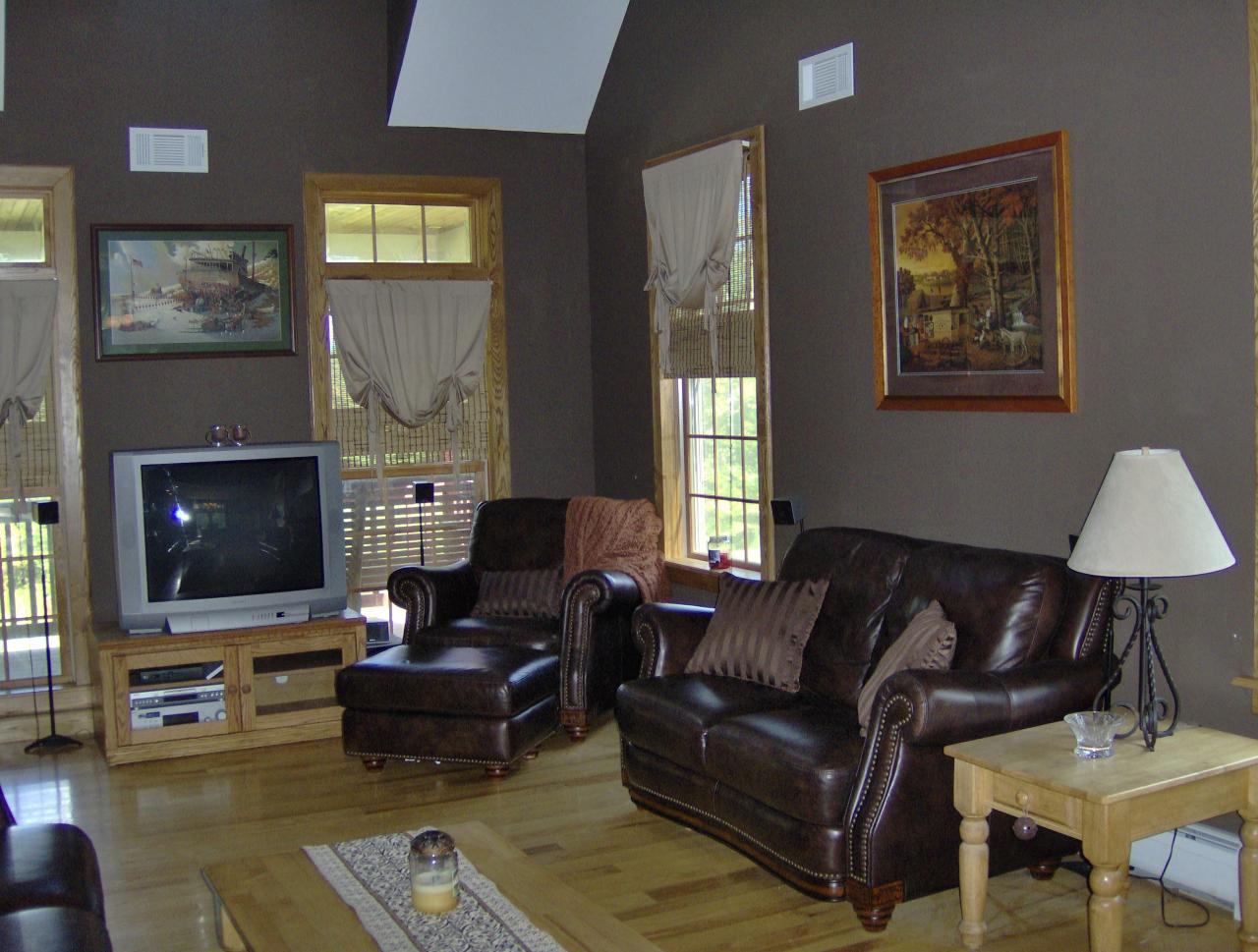 998 Williamsburg Road Ashfield, MA 01330 - Photo 14 of 46 a living room with furniture fireplace and a flat screen tv