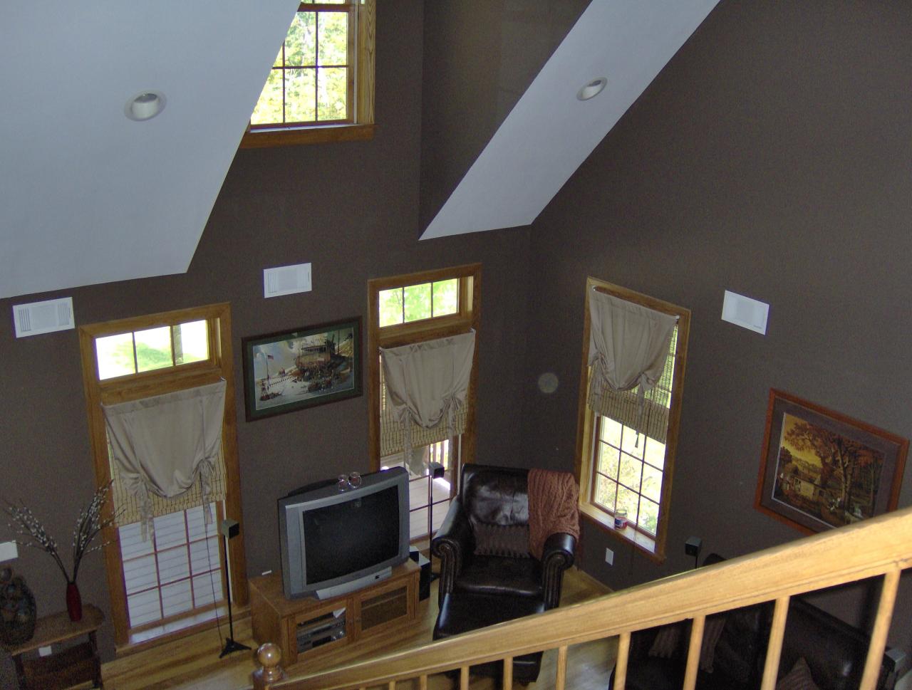 998 Williamsburg Road Ashfield, MA 01330 - Photo 16 of 46 a living room with furniture a flat screen tv and floor to ceiling window