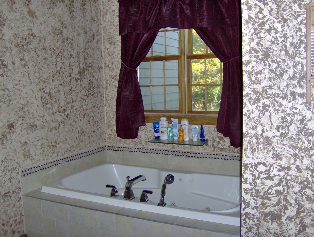 998 Williamsburg Road Ashfield, MA 01330 - Photo 19 of 46 a bathroom with a bathtub and window