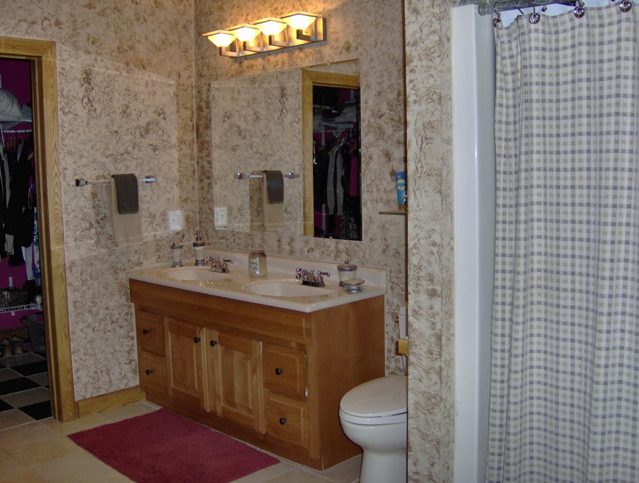 998 Williamsburg Road Ashfield, MA 01330 - Photo 20 of 46 a bathroom with a sink a toilet and shower