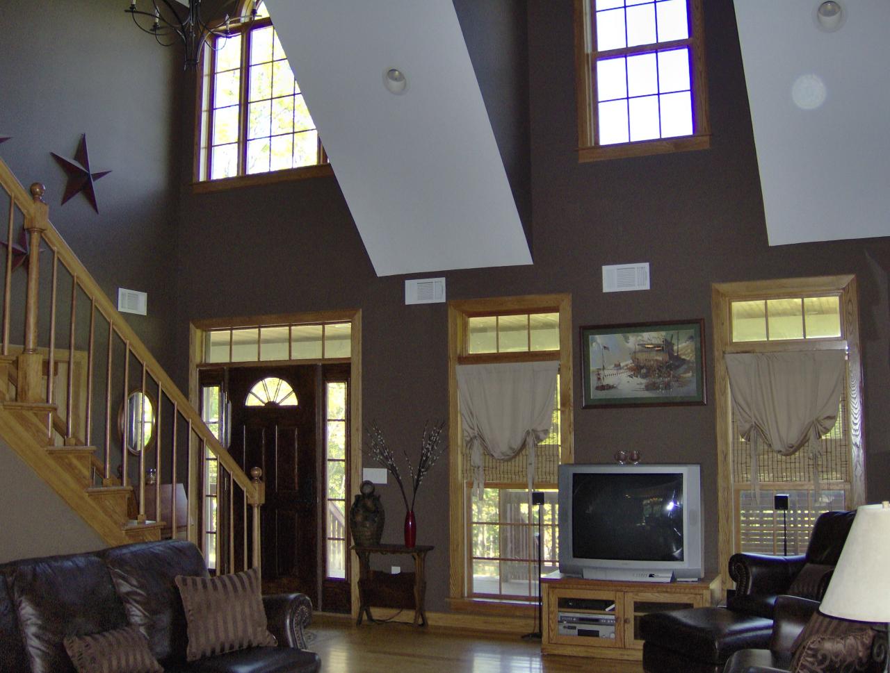 998 Williamsburg Road Ashfield, MA 01330 - Photo 3 of 46 a living room with furniture a flat screen tv and a fireplace