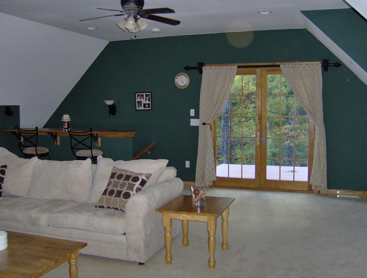 998 Williamsburg Road Ashfield, MA 01330 - Photo 24 of 46 a living room with furniture and a large window