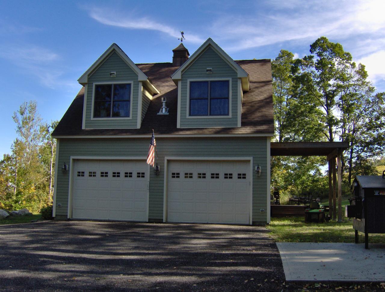 998 Williamsburg Road Ashfield, MA 01330 - Photo 43 of 46 a front view of a house with a yard