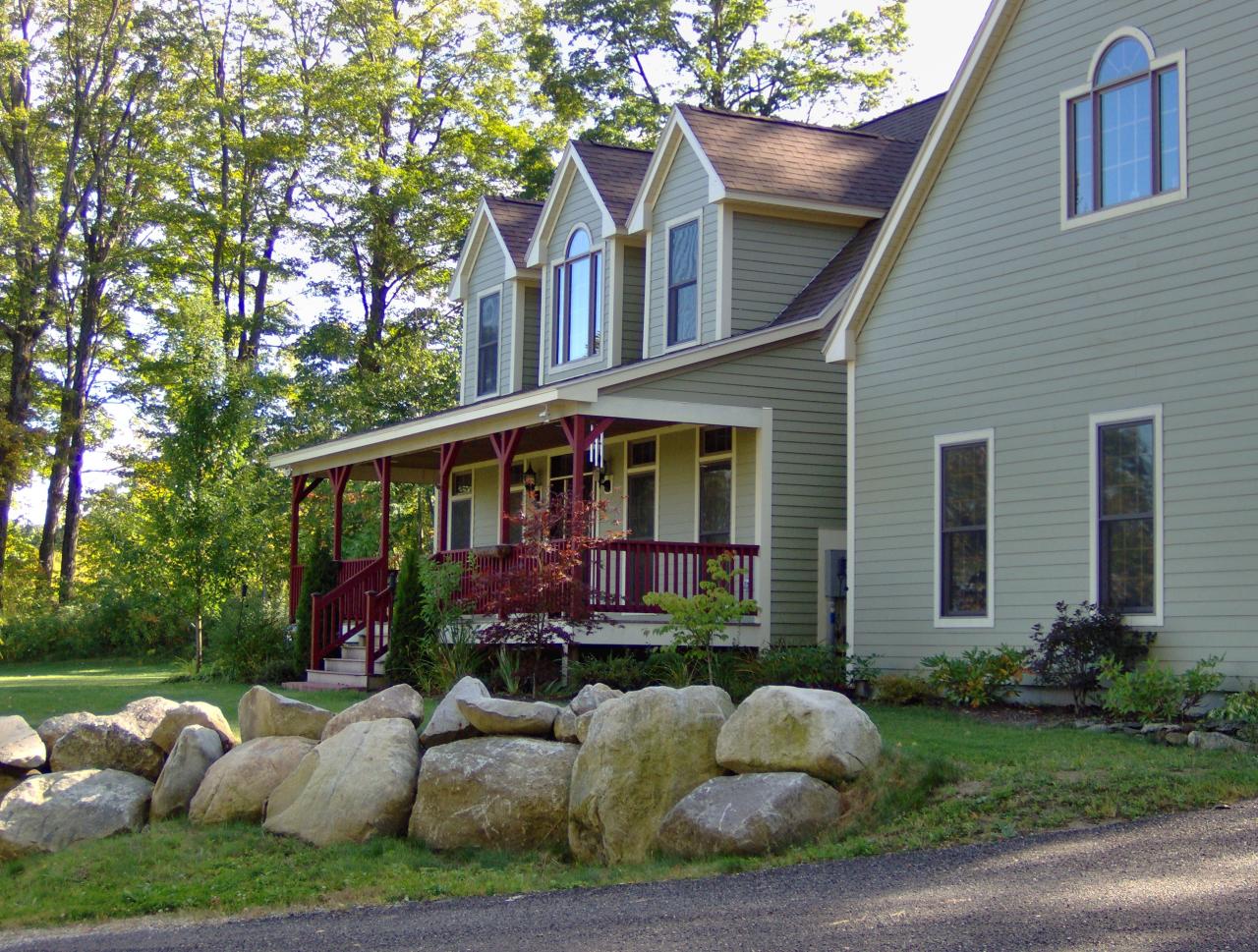 998 Williamsburg Road Ashfield, MA 01330 - Photo 45 of 46 a front view of a house with garden