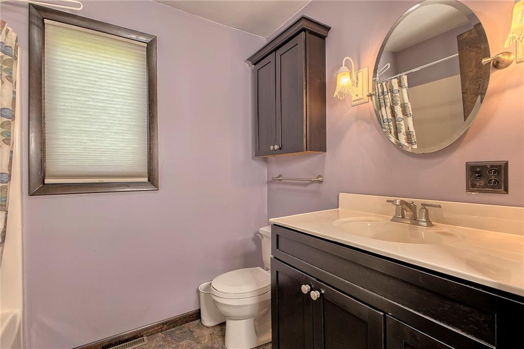 4462 Rte 286 Highway East Indiana, PA 15701 - Photo 13 of 46 a bathroom with a sink a toilet and a mirror