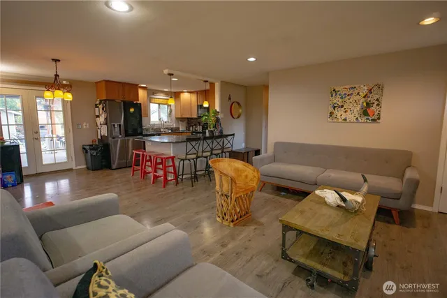 a view of a room with gym equipment and a window