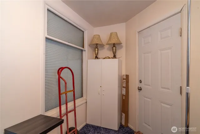 a view of a room with rack on the wall