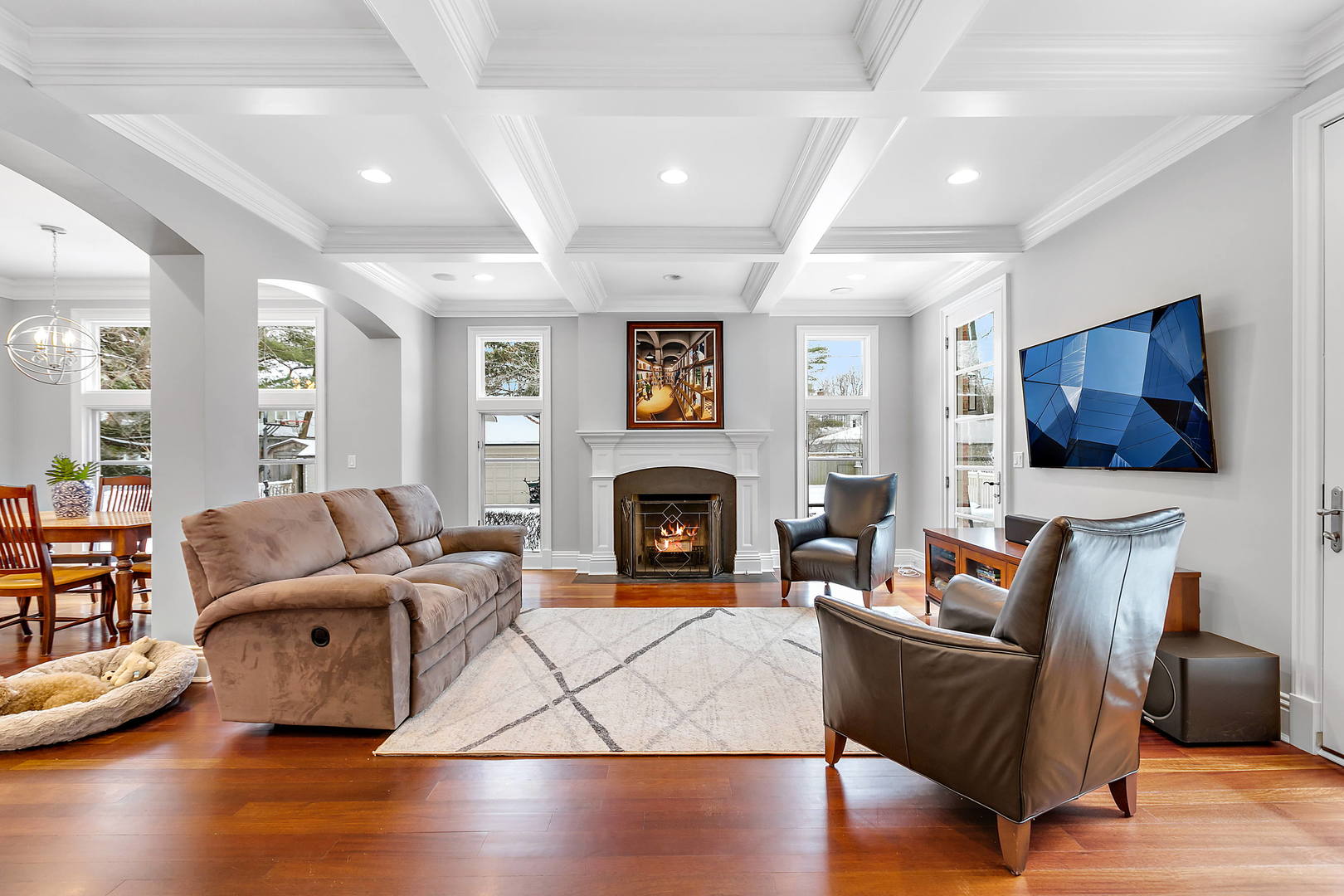 594 Willow Road Winnetka, IL 60093 - Photo 12 of 41 a living room with furniture and a fireplace